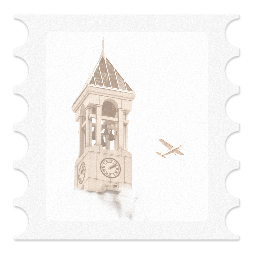 A stamp showing the Purdue University bell tower with a airplane flying past in the sky